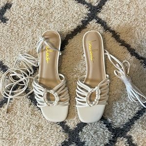 Lulus never worn white ankle wrap sandals.